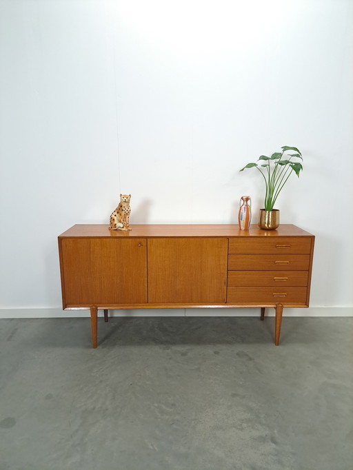 Sideboard with high legs and drawers