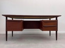 Iconica scrivania in teak di metà secolo, progettata da Tijsseling per Hulmefa negli anni '60.