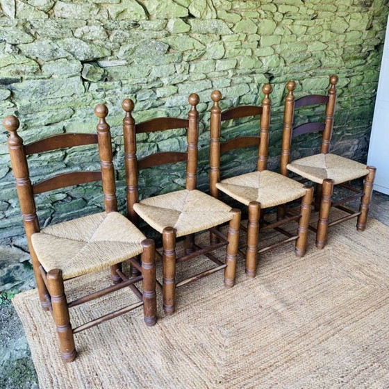 Image 1 of Set van 4 massief houten stoelen met rieten zittingen