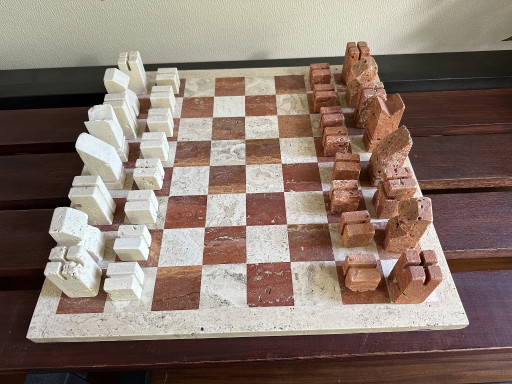 Design Chess Set in two-tone Travertine, Angelo Mangiarotti