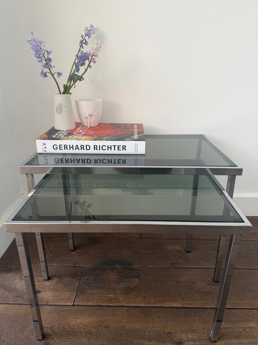 Vintage design bijzettafels / miniset chroom blad van (rook) glas 