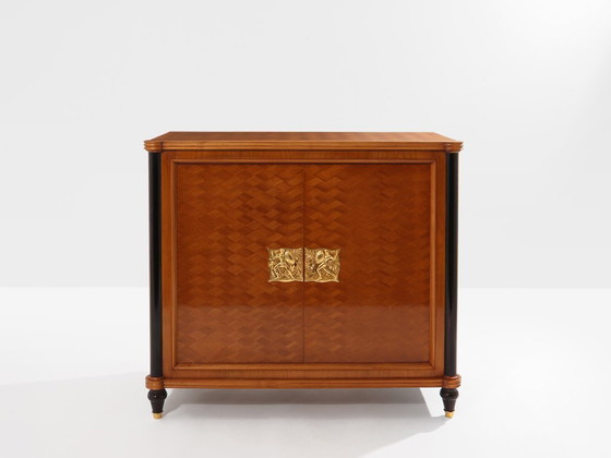 Image 1 of Meuble à deux portes Jules Leleu en bois de cerisier marqueté de bronze, 1940