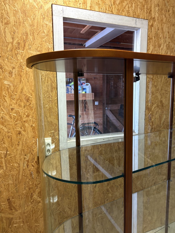 Image 1 of Vintage Fiam Italia oval cherry wood and glass display cabinet