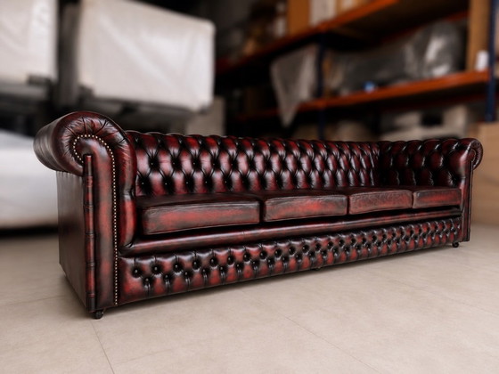 Ossenbloedrode Chesterfield 4-zitsbank met oorfauteuil – 3-5 zitsbanken, Leather (photo 6 of 10)