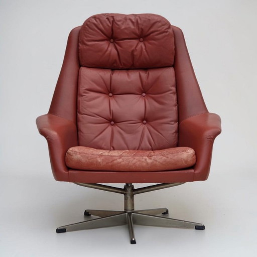 Sillón giratorio de diseño danés de H.W. Klein, década de 1970, tapizado en cuero.