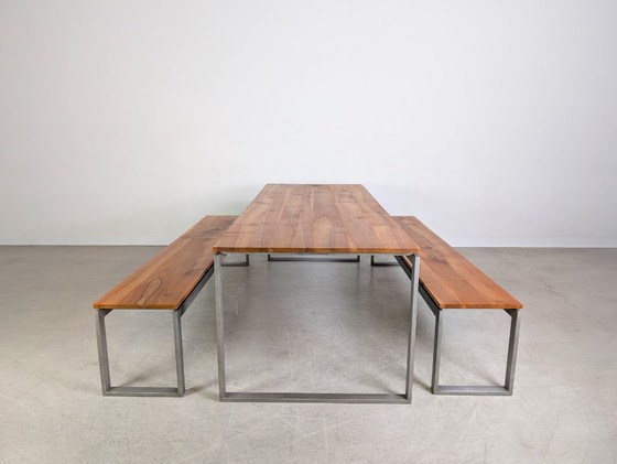 Image 1 of Ensemble table et chaises de style industriel comprenant 2 bancs, banc design, style vintage