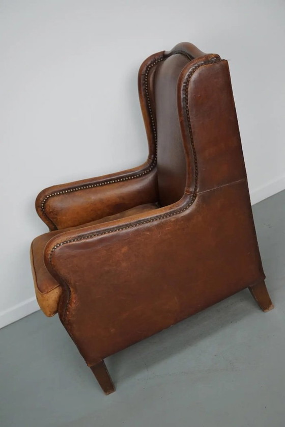 Image 1 of Vintage Nederlandse clubfauteuil van cognackleurig leer