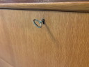 Wooden liquor cabinet with flap door, light brown