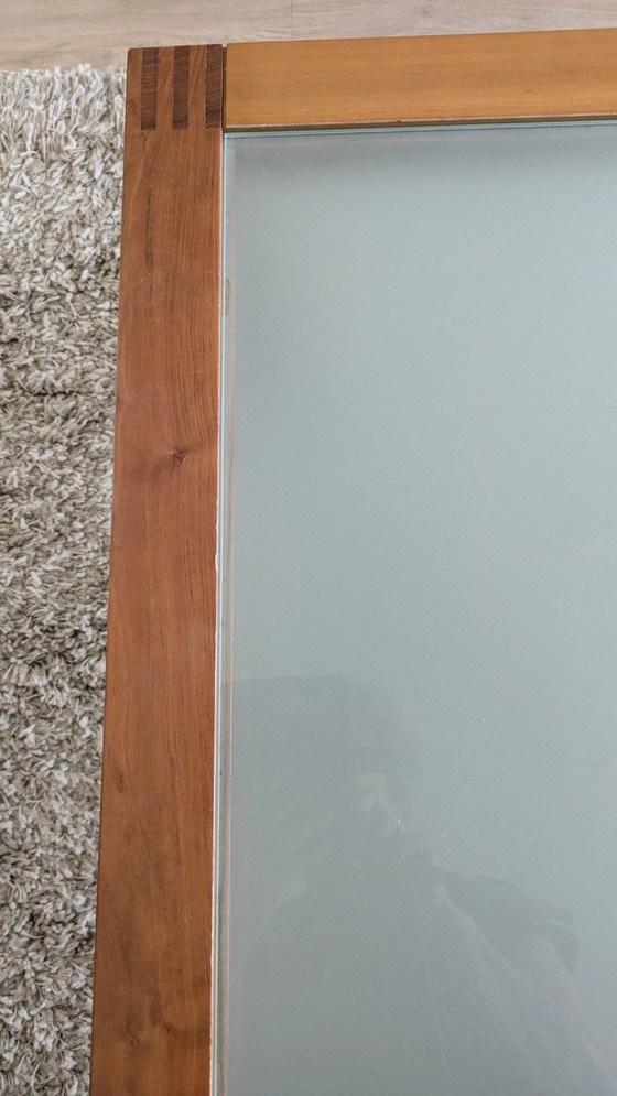 Image 1 of cherry wood red coffee table with sleek glass top from 1996