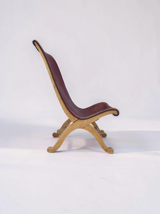 Image 1 of Slipper chair van rood leer van Pierre Lottier voor Valenti