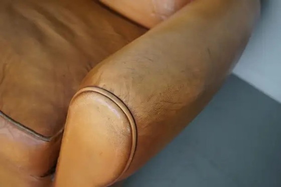 Image 1 of Set Franse cognackleurige leren clubfauteuils met ‘moustache’-rugleuning, jaren 1950