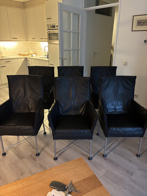 Image 1 of 6 zwarte Montis Chaplin stoelen met rvs onderstel