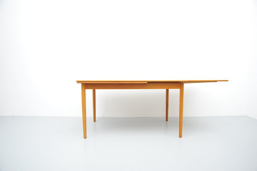 Extendable teak dining table from AR Mobler