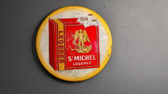 Image 1 of Enamel sign St Michel Cigarettes, 1953 