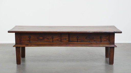 Large antique coffee table with original details and a patina