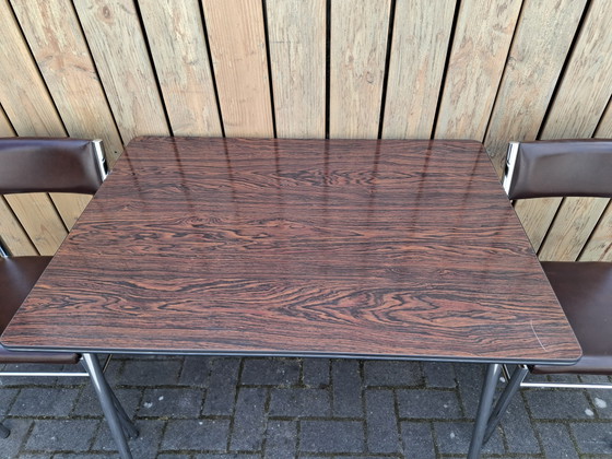 Image 1 of Vintage kitchen table with 2 chairs. 1960s