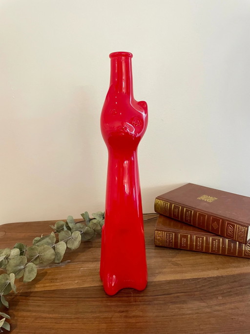 Rode katvormige fles