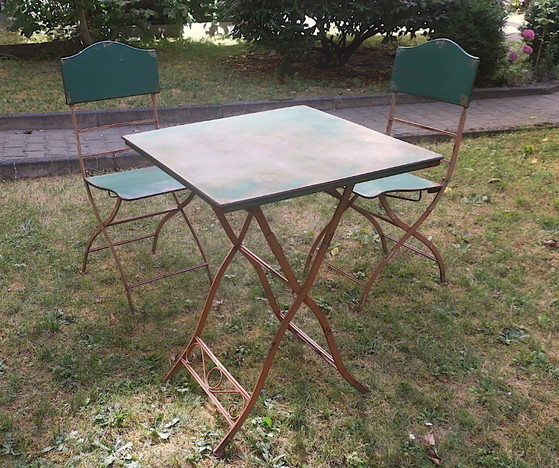 Image 1 of Table de jardin et 2 chaises en fer peint vieilli, style années 1960