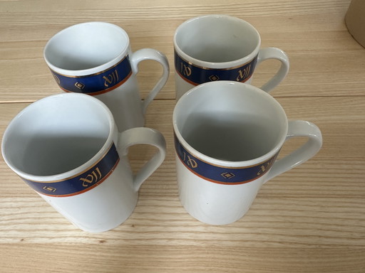 4 cups Sabira Manek for DSM Elastomers.