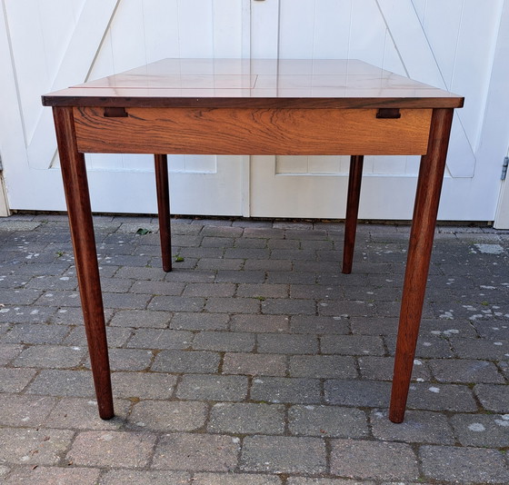 Image 1 of Mesa de comedor de diseño danés en madera de palisandro.