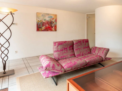 Designer 2-seater sofa with adjustable elements – statement piece