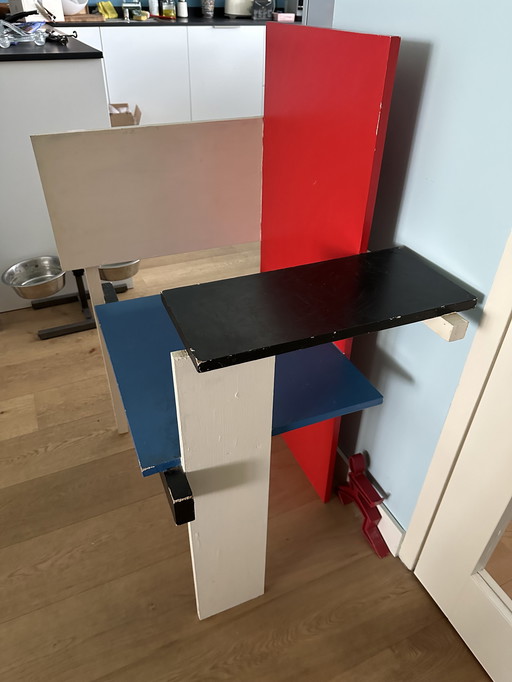 Red, blue white chair