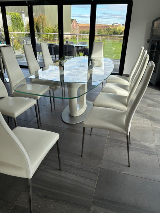 Stunning, authentic Calligaris dining set featuring the iconic Orbital extending table paired with 10 – Glass (photo 4 of 8)