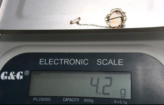 Image 1 of Bellissima spilla in oro 375 9kt con cammeo.