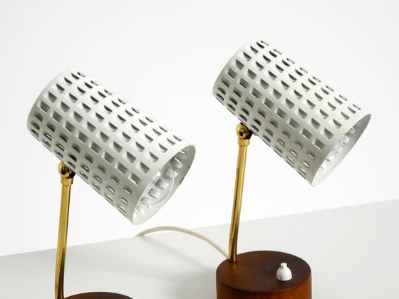 Image 1 of A pair of beautiful mid-century modern bedside lamps with perforated metal shades and teak wood bases