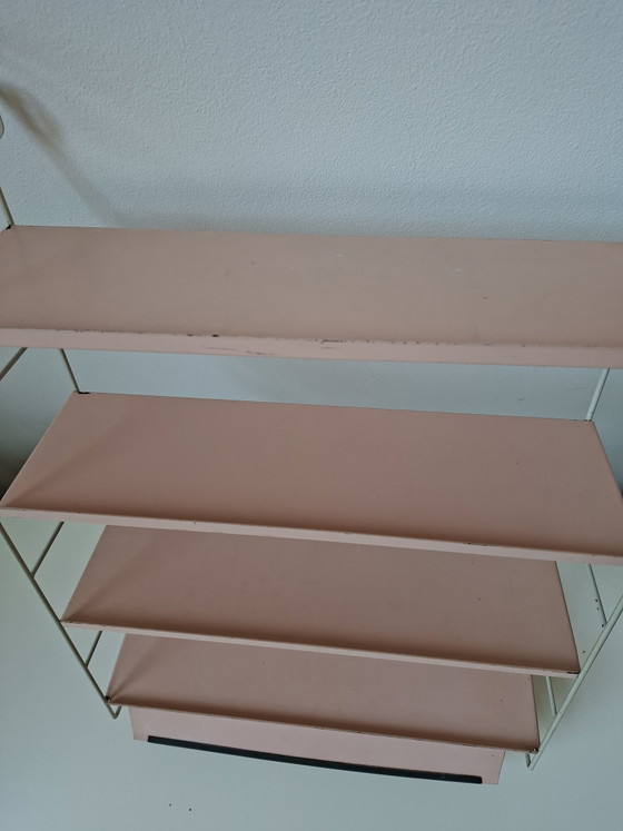 Image 1 of Raro estante de pared con la marca Tomado Holland