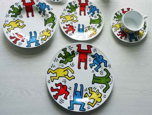 Keith Haring Dinnerware: 3 different sized plates, 1 coffee cup and saucer.