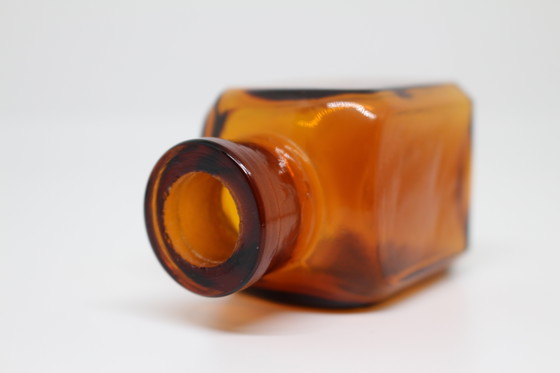 Image 1 of Klein amberkleurig apothekersflesje