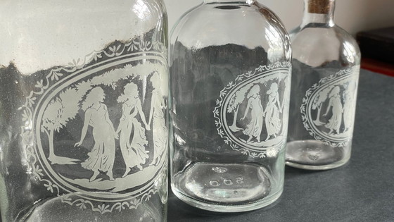 Image 1 of Vintage Engraved Glass and Wood Bottles