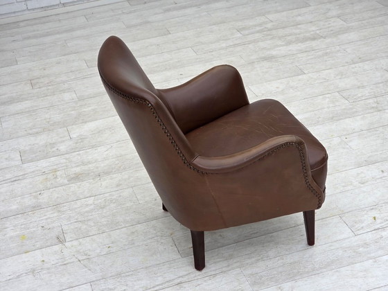 Image 1 of Dänischer Sessel aus den 1960er Jahren, Möbelleder, Beine aus Eschenholz.