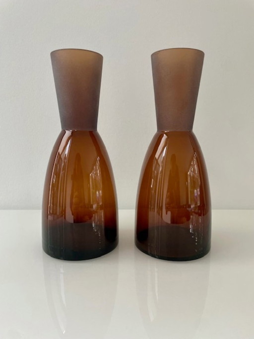 Set of 2 amber-colored Scandinavian design carafes / vases