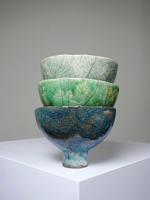 Trio of small vintage raku footed bowls