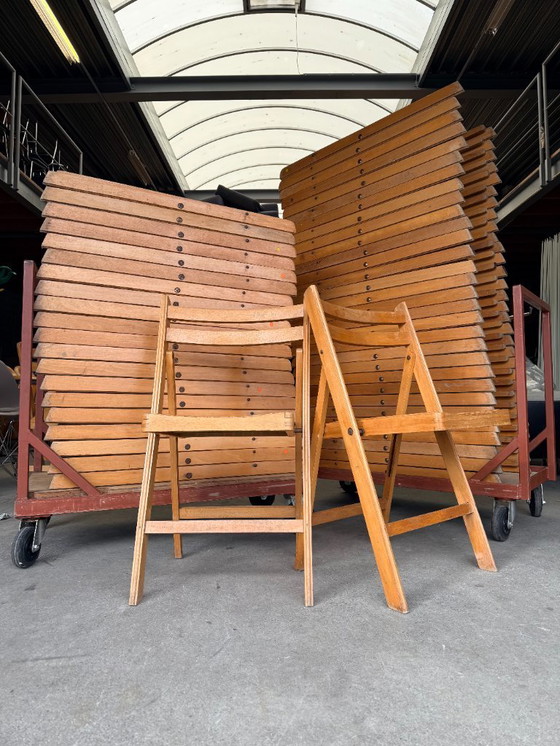 Image 1 of Chaises pliantes vintage en bois (plusieurs disponibles)