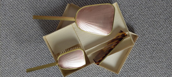 Image 1 of Ensemble de coiffeuse vintage, miroir à main, brosse et peigne.