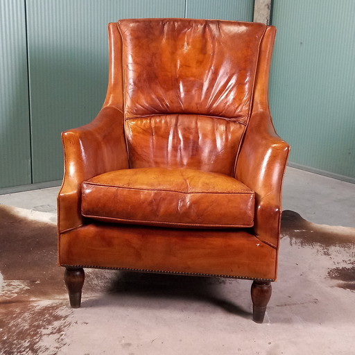 Fauteuil lounge vintage en peau de mouton