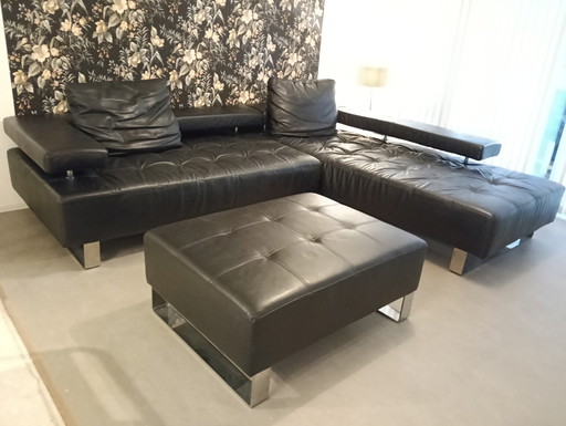 Ecksofa aus Leder und Hocker Montel Cipriani