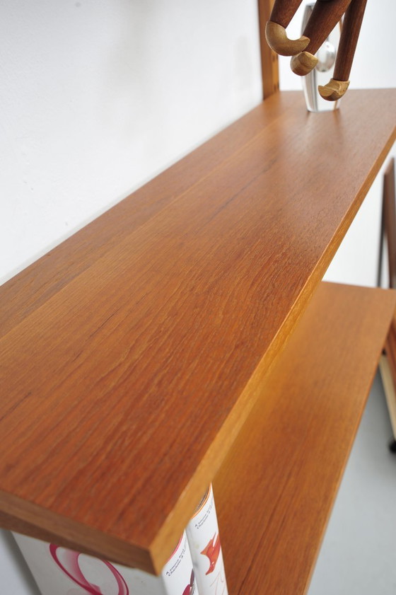 Image 1 of "Royal System" wall shelf made of teak by Poul Cadovius for CADO (1950s)