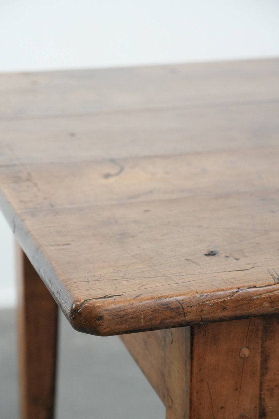 Image 1 of Early 19th century French fruitwood dining table with two drawers