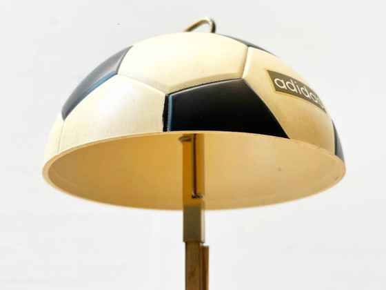 Image 1 of Vintage Adidas cigarette dispenser from the 1970s