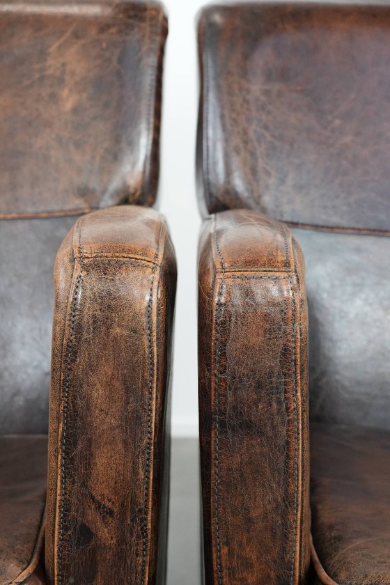 Image 1 of 2 eleganti poltrone di design in pelle di pecora con splendidi colori intensi e un design senza tempo