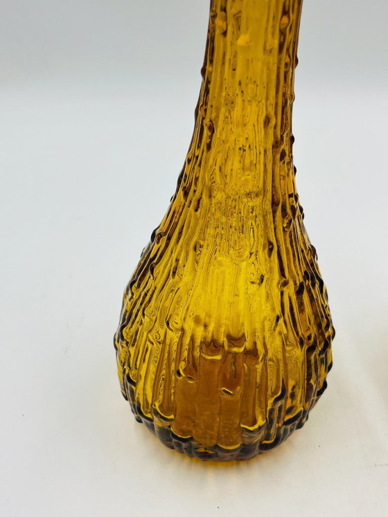 Image 1 of Set van twee vintage Empoli-flessen van getextureerd amberkleurig glas.