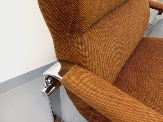 Image 1 of Een paar vintage Eero Aarnio fauteuils voor Framac, uitgevoerd in stof en chroom, uit de jaren 60 en 70.
