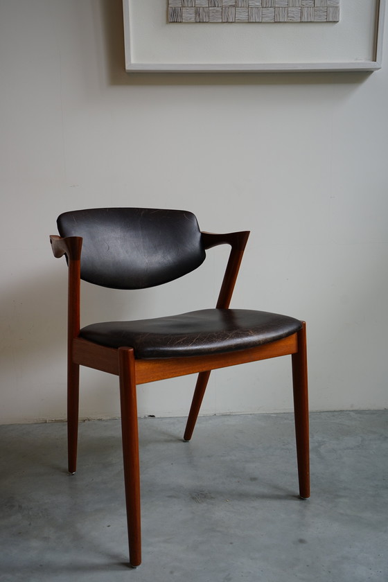 Image 1 of 6 Kai Kristiansen stoelen | Model 42 | Teak Leder patina