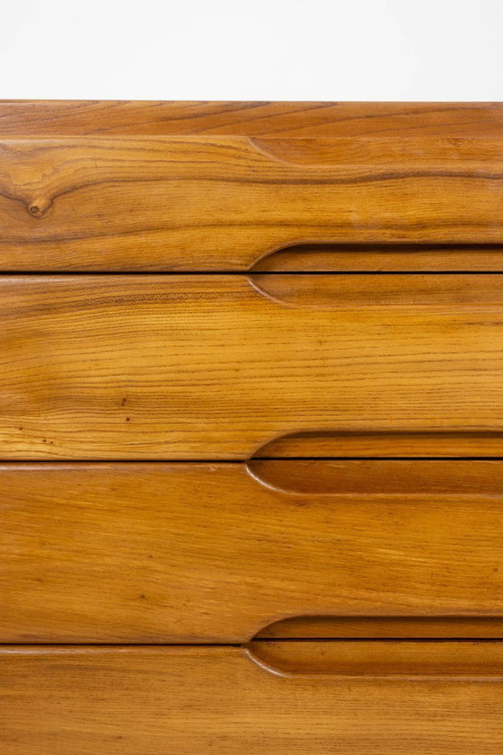 Image 1 of Maison Regain. Cassettiera in olmo. Circa 1970.