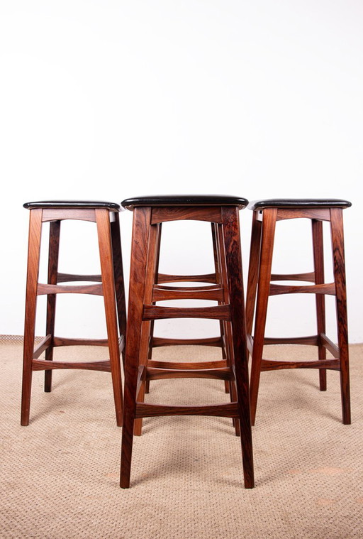 4 Sgabelli da bar danesi in palissandro e pelle nera di Knud Bent per Dyrlund 1960.