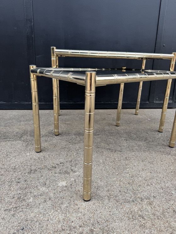 Image 1 of Nesting tables in gold-tone metal, bamboo, and mirror, 1970s style